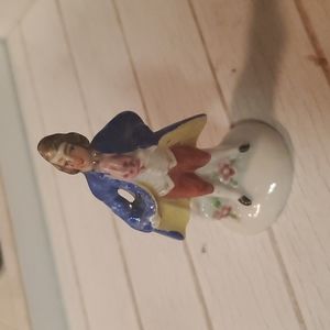 Vintage French Colonial Man with Roses Statue